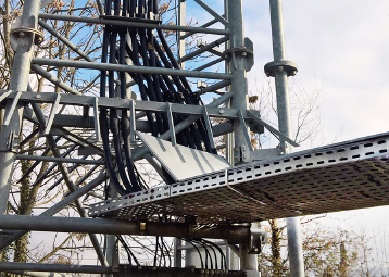 telecom cabling and metal structure on mobile network tower